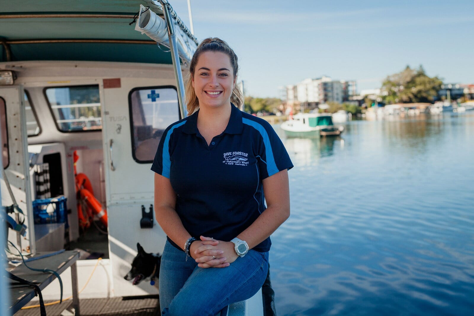 Gabby Hunter seated on a boat