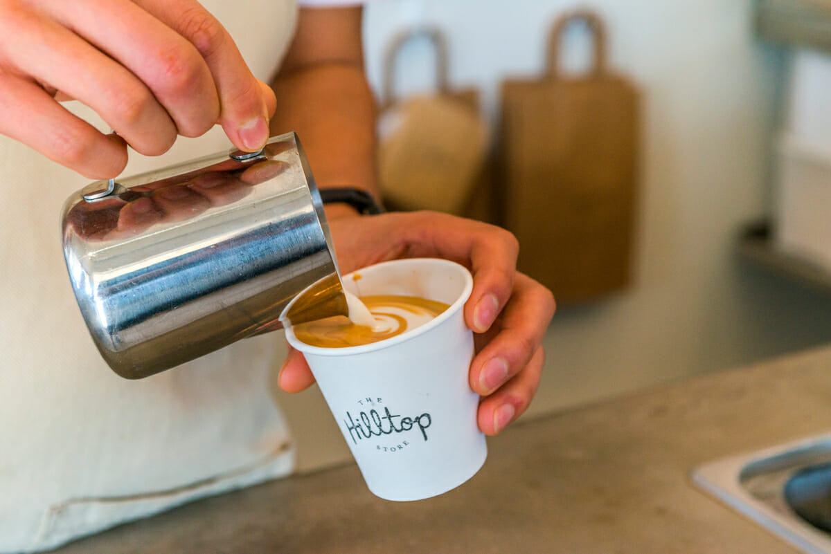 Hilltop coffee being poured