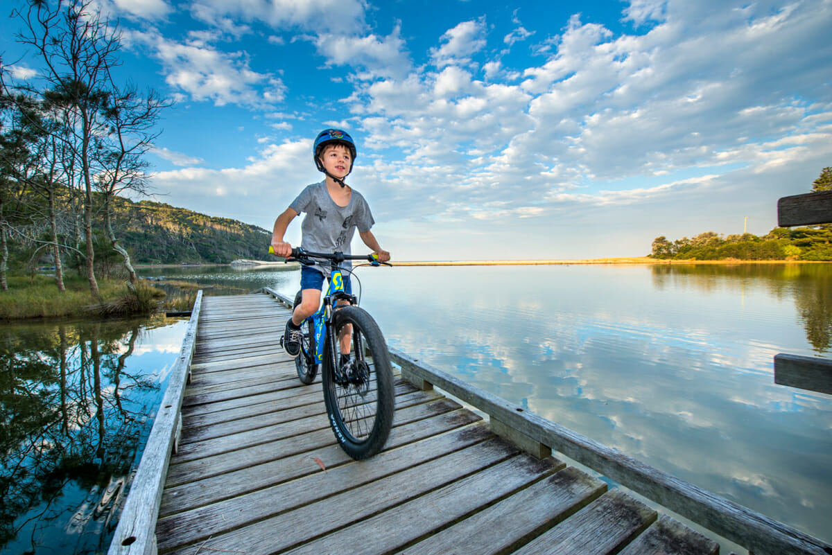 Boy mountain biking