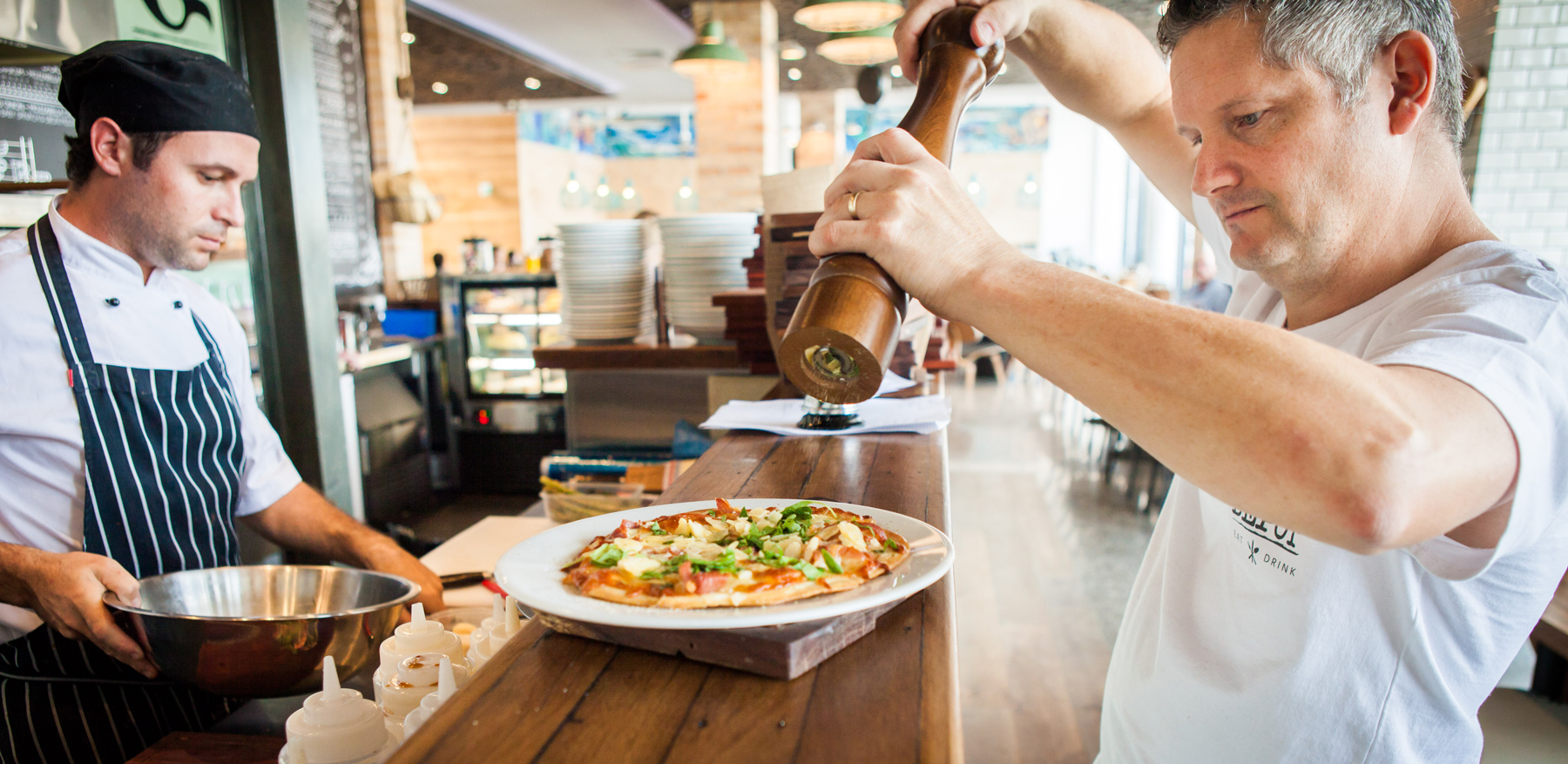 david preparing a pizza