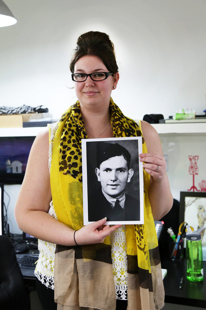  Carina Pascoe – Graphic Designer at Gowing Bros Ltd. holding a photo of her Grandfather 