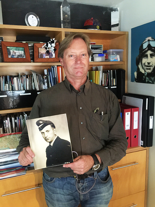 John Gowing – Managing Director of Gowing Bros Ltd. Holding a photo of his Father as he tells his veteran stories. 