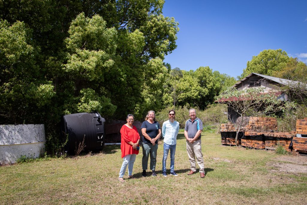 The team standing at the site of the Plastic Collective's Bowraville resource recovery centre