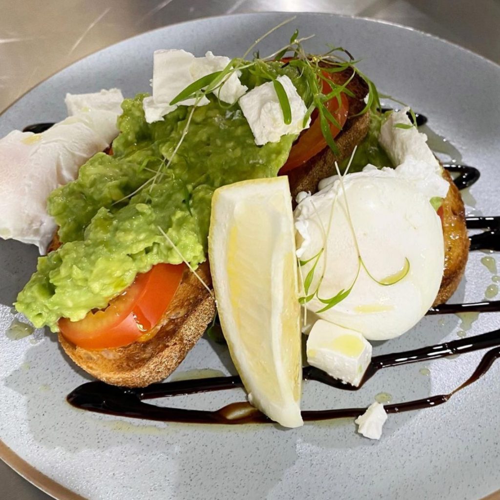 Avocado and a peached egg on sourdough toast at Hub Cafe 