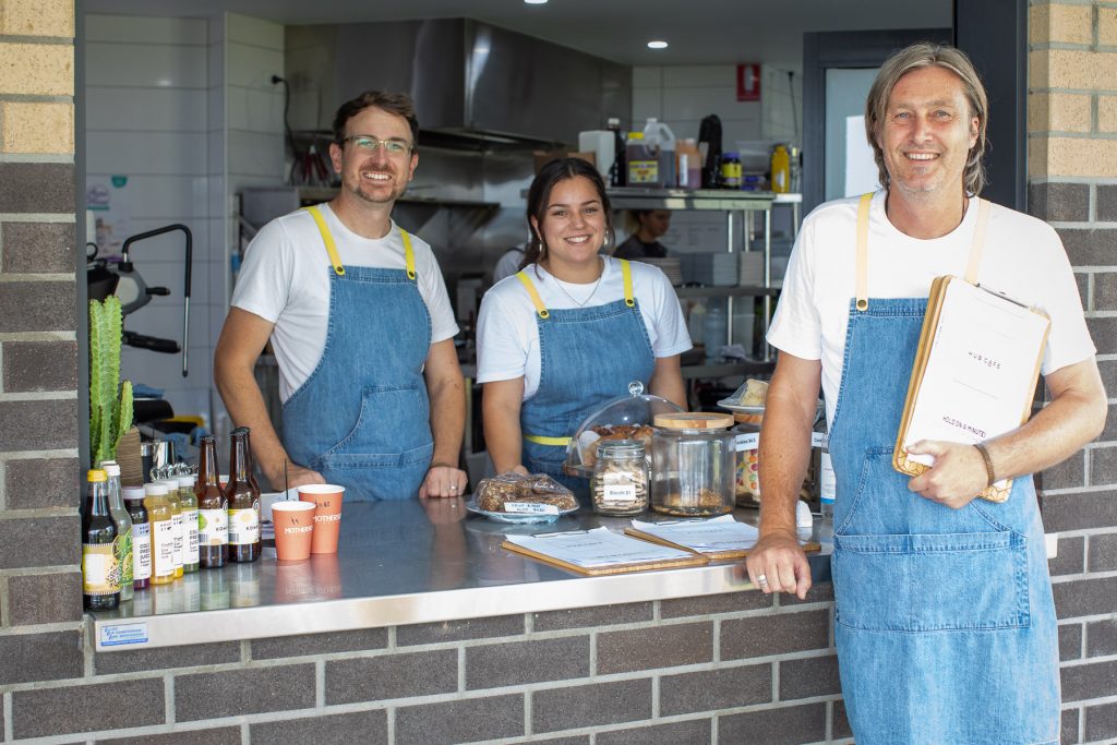 Jono and his team behind the counter at Hub Cafe Woolgoolga