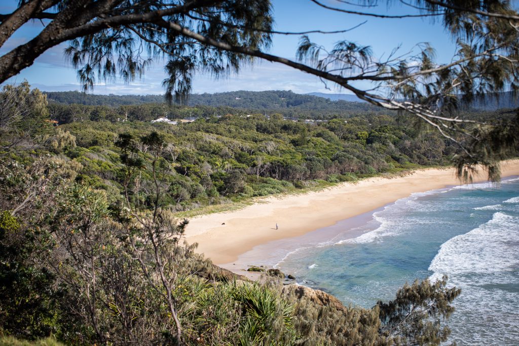 Wide shot of Sapphire Beach from the headland