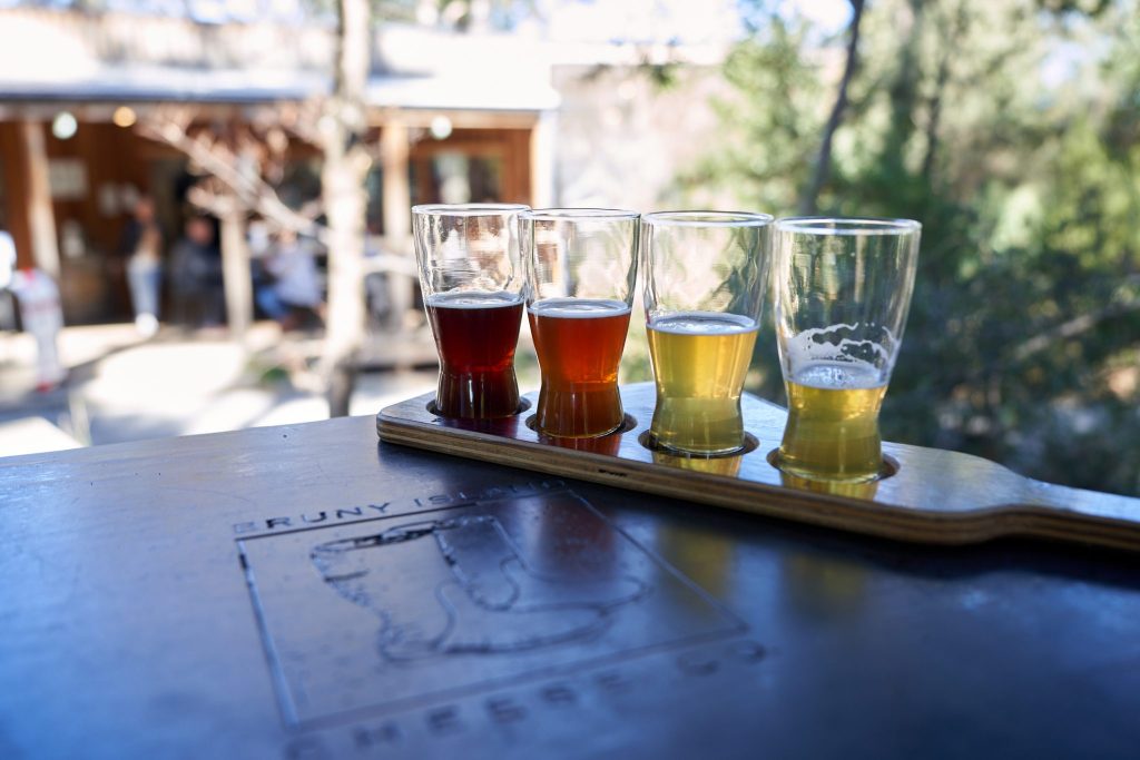 Four beers on a board