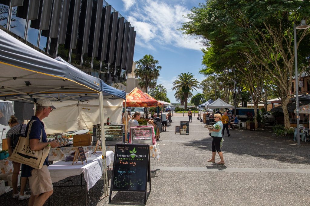 Wide shot of an outdoor fresh food market 