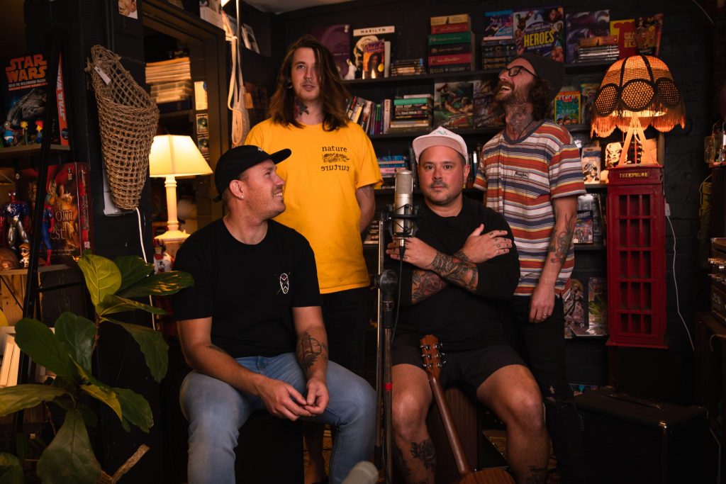 Portrait of a young punk band in a record store