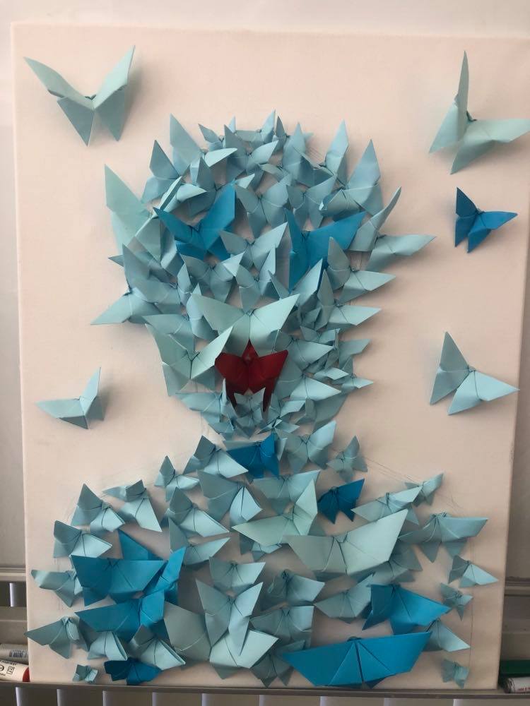 An artwork made of origami butterflies