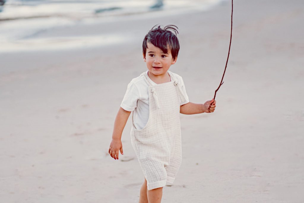 Grow Baby Co boy on the beach