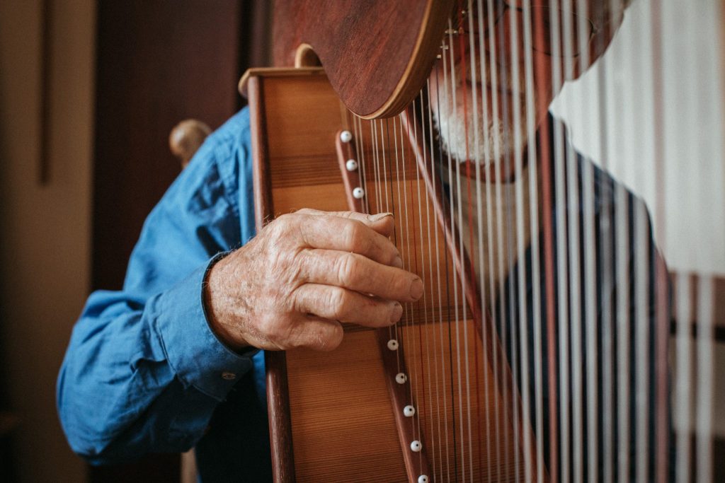 Man playing the harp