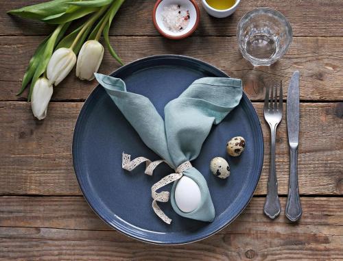 Easter festive table setting in blue. 