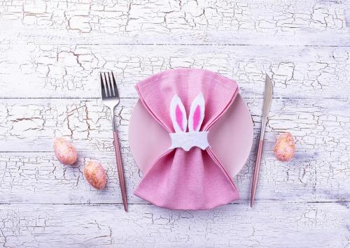 Easter table setting in pink color. 